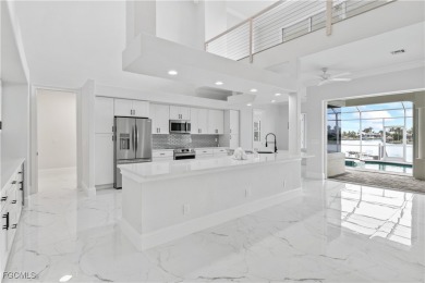 Welcome to your GULF ACCESS DREAM HOME! A commanding 4-bedroom on Palmetto-Pine Country Club in Florida - for sale on GolfHomes.com, golf home, golf lot