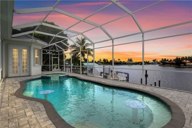 Welcome to your GULF ACCESS DREAM HOME! A commanding 4-bedroom on Palmetto-Pine Country Club in Florida - for sale on GolfHomes.com, golf home, golf lot
