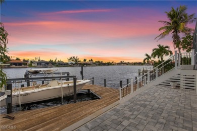 Welcome to your GULF ACCESS DREAM HOME! A commanding 4-bedroom on Palmetto-Pine Country Club in Florida - for sale on GolfHomes.com, golf home, golf lot
