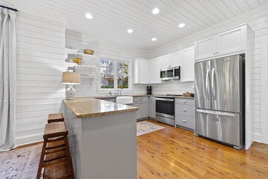 Experience golf course living in The Grove at Cuscowilla! This on The Golf Club at Cuscowilla in Georgia - for sale on GolfHomes.com, golf home, golf lot