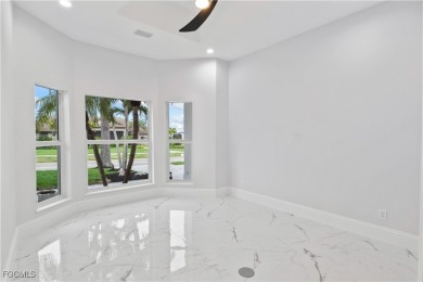 Welcome to your GULF ACCESS DREAM HOME! A commanding 4-bedroom on Palmetto-Pine Country Club in Florida - for sale on GolfHomes.com, golf home, golf lot