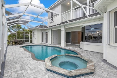 Welcome to your GULF ACCESS DREAM HOME! A commanding 4-bedroom on Palmetto-Pine Country Club in Florida - for sale on GolfHomes.com, golf home, golf lot
