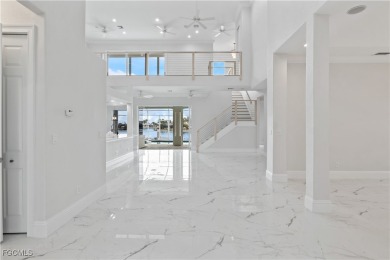 Welcome to your GULF ACCESS DREAM HOME! A commanding 4-bedroom on Palmetto-Pine Country Club in Florida - for sale on GolfHomes.com, golf home, golf lot