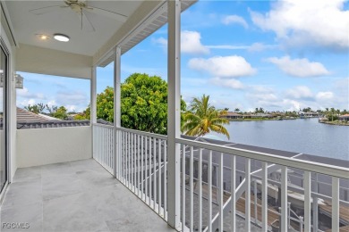 Welcome to your GULF ACCESS DREAM HOME! A commanding 4-bedroom on Palmetto-Pine Country Club in Florida - for sale on GolfHomes.com, golf home, golf lot