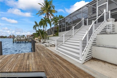 Welcome to your GULF ACCESS DREAM HOME! A commanding 4-bedroom on Palmetto-Pine Country Club in Florida - for sale on GolfHomes.com, golf home, golf lot