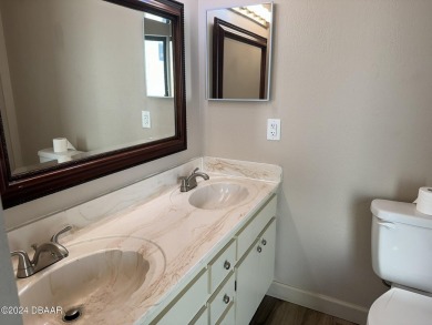Charming 2/2 in Pelican Bay - Your Ideal Private Retreat - In A on The Club At Pelican Bay - South Course in Florida - for sale on GolfHomes.com, golf home, golf lot