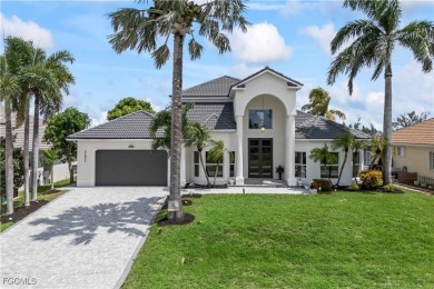 Welcome to your GULF ACCESS DREAM HOME! A commanding 4-bedroom on Palmetto-Pine Country Club in Florida - for sale on GolfHomes.com, golf home, golf lot