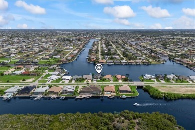 Welcome to your GULF ACCESS DREAM HOME! A commanding 4-bedroom on Palmetto-Pine Country Club in Florida - for sale on GolfHomes.com, golf home, golf lot