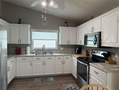 This meticulously maintained 2BR,2b Turnkey home is ready for on Plantation Golf Club in Florida - for sale on GolfHomes.com, golf home, golf lot