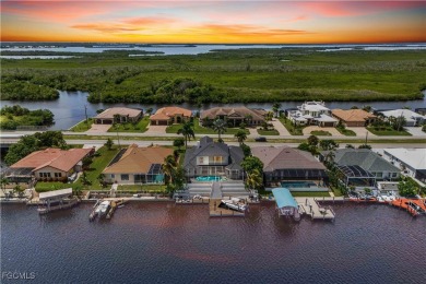 Welcome to your GULF ACCESS DREAM HOME! A commanding 4-bedroom on Palmetto-Pine Country Club in Florida - for sale on GolfHomes.com, golf home, golf lot