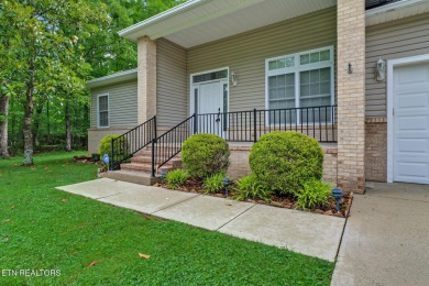 Check out this great home with beautiful views located right on Lake Tansi Village Country Club in Tennessee - for sale on GolfHomes.com, golf home, golf lot