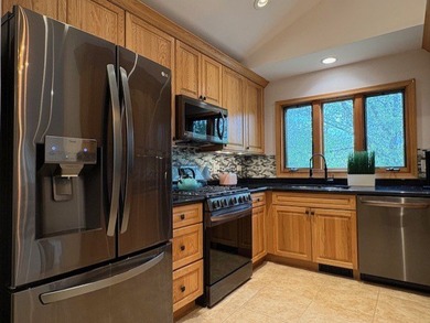 Get ready for the WOW factor! Gorgeous upper floor townhome on Fox Run Golf Links in Illinois - for sale on GolfHomes.com, golf home, golf lot