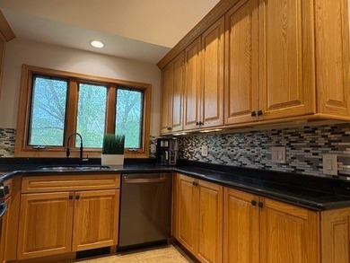 Get ready for the WOW factor! Gorgeous upper floor townhome on Fox Run Golf Links in Illinois - for sale on GolfHomes.com, golf home, golf lot