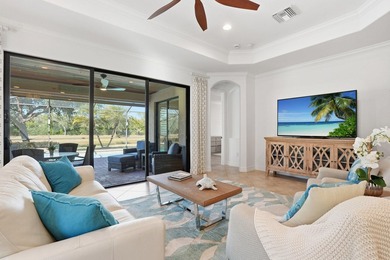 Discover the essence of Naples resort living in this beautifully on The Golf Club At Fiddlers Creek in Florida - for sale on GolfHomes.com, golf home, golf lot