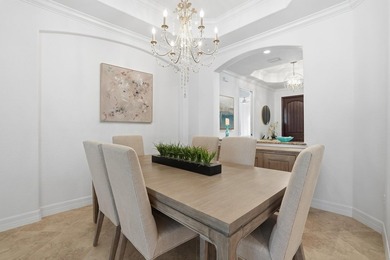 Discover the essence of Naples resort living in this beautifully on The Golf Club At Fiddlers Creek in Florida - for sale on GolfHomes.com, golf home, golf lot