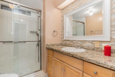 Own this home in the resort like community of Barefoot Bay on Barefoot Bay Golf Course in Florida - for sale on GolfHomes.com, golf home, golf lot