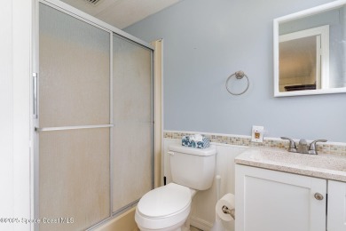 Own this home in the resort like community of Barefoot Bay on Barefoot Bay Golf Course in Florida - for sale on GolfHomes.com, golf home, golf lot