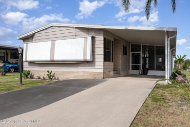 Own this home in the resort like community of Barefoot Bay on Barefoot Bay Golf Course in Florida - for sale on GolfHomes.com, golf home, golf lot