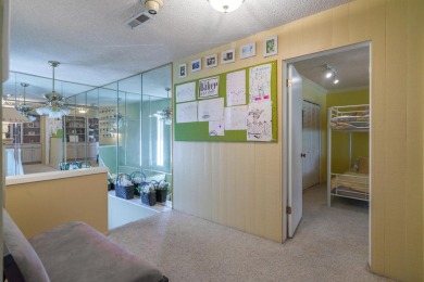 This spacious 4-bedroom, 3-bathroom townhouse is nestled right on Bloomington Country Club in Utah - for sale on GolfHomes.com, golf home, golf lot