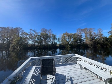 Fabulous 2-bedroom 2 bath home in an active community in on Bay Tree Golf Course in Florida - for sale on GolfHomes.com, golf home, golf lot