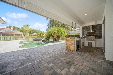 Fantastic pool home located in Hunter's Green. Hunter's Green is on Hunters Green Country Club in Florida - for sale on GolfHomes.com, golf home, golf lot