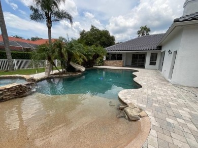 Fantastic pool home located in Hunter's Green. Hunter's Green is on Hunters Green Country Club in Florida - for sale on GolfHomes.com, golf home, golf lot