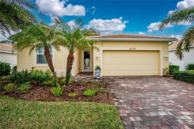 This home offers an ideal blend of modern comfort and elegant on Heron Creek Golf and Country Club in Florida - for sale on GolfHomes.com, golf home, golf lot