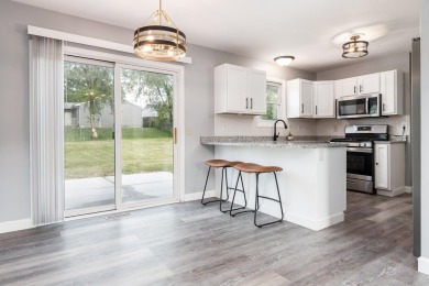 Beautiful 3 bedroom, 1.5 bath, two-story home with a 2 car on Sandy Hollow Golf Course in Illinois - for sale on GolfHomes.com, golf home, golf lot