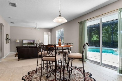 Welcome to this well-maintained two-story pool home located on a on North Shore Golf Club in Florida - for sale on GolfHomes.com, golf home, golf lot