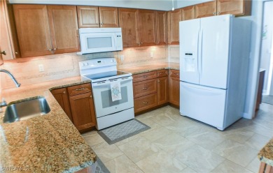 Enjoy Amazing Lake views from this very spacious 1862 s.f on Cypress Lake Country Club in Florida - for sale on GolfHomes.com, golf home, golf lot