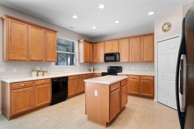 Welcome to this well-maintained two-story pool home located on a on North Shore Golf Club in Florida - for sale on GolfHomes.com, golf home, golf lot