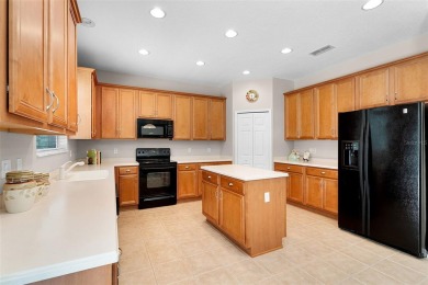 Welcome to this well-maintained two-story pool home located on a on North Shore Golf Club in Florida - for sale on GolfHomes.com, golf home, golf lot