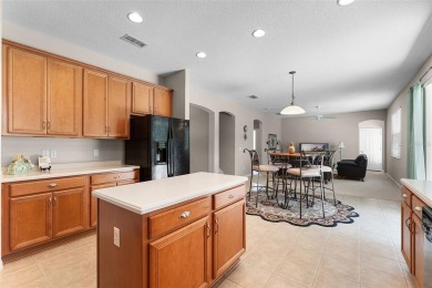 Welcome to this well-maintained two-story pool home located on a on North Shore Golf Club in Florida - for sale on GolfHomes.com, golf home, golf lot