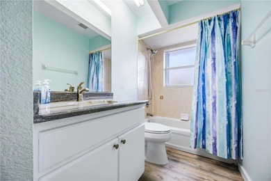 Beautifully updated 3-bedroom, 2-bath home located in the on Deep Creek Golf Club in Florida - for sale on GolfHomes.com, golf home, golf lot