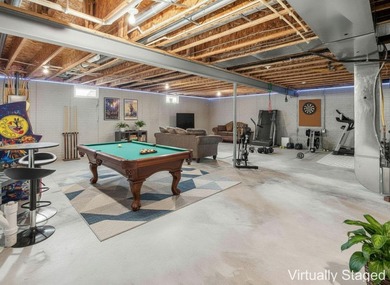 This expansive home offers 3,700 sq. ft. in a 5 level split with on Kinsale Golf and Fitness Club in Ohio - for sale on GolfHomes.com, golf home, golf lot