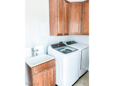 Enjoy Amazing Lake views from this very spacious 1862 s.f on Cypress Lake Country Club in Florida - for sale on GolfHomes.com, golf home, golf lot