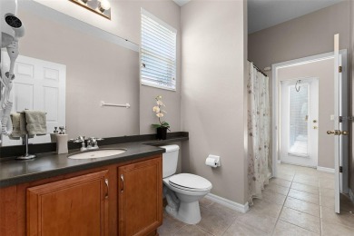 Welcome to this well-maintained two-story pool home located on a on North Shore Golf Club in Florida - for sale on GolfHomes.com, golf home, golf lot