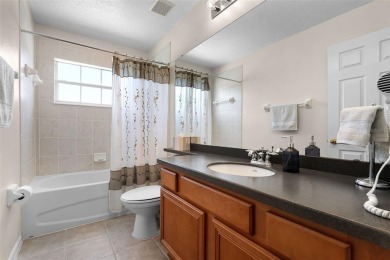 Welcome to this well-maintained two-story pool home located on a on North Shore Golf Club in Florida - for sale on GolfHomes.com, golf home, golf lot
