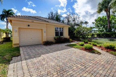 Nestled on a spectacular private tropically landscaped lot with on Gleneagles Golf and Country Club in Florida - for sale on GolfHomes.com, golf home, golf lot