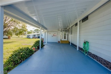 Remodeled with a new roof, new garage for golf cart, and a on Lake Fairways Country Club in Florida - for sale on GolfHomes.com, golf home, golf lot