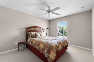 Welcome to this well-maintained two-story pool home located on a on North Shore Golf Club in Florida - for sale on GolfHomes.com, golf home, golf lot