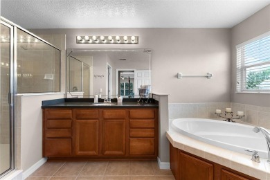 Welcome to this well-maintained two-story pool home located on a on North Shore Golf Club in Florida - for sale on GolfHomes.com, golf home, golf lot