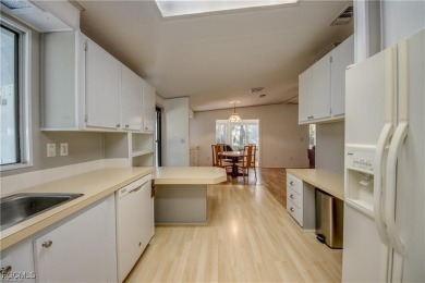 Remodeled with a new roof, new garage for golf cart, and a on Lake Fairways Country Club in Florida - for sale on GolfHomes.com, golf home, golf lot