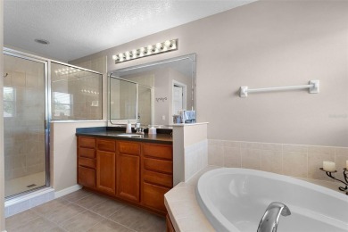Welcome to this well-maintained two-story pool home located on a on North Shore Golf Club in Florida - for sale on GolfHomes.com, golf home, golf lot