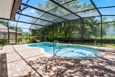 Welcome to this well-maintained two-story pool home located on a on North Shore Golf Club in Florida - for sale on GolfHomes.com, golf home, golf lot