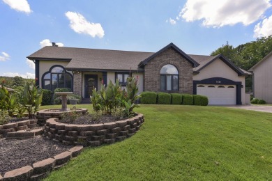 Updated home with an incredible golf course view overlooking the on Pointe Royale Village Country Club in Missouri - for sale on GolfHomes.com, golf home, golf lot
