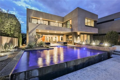 Perched elegantly above the shimmering waters of Lake Las Vegas on Reflection Bay Golf Club in Nevada - for sale on GolfHomes.com, golf home, golf lot