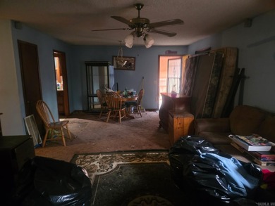 Nestled in the quiet, wooded Cartagena neighborhood of Hot on DeSoto Golf Course in Arkansas - for sale on GolfHomes.com, golf home, golf lot