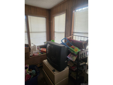 Nestled in the quiet, wooded Cartagena neighborhood of Hot on DeSoto Golf Course in Arkansas - for sale on GolfHomes.com, golf home, golf lot