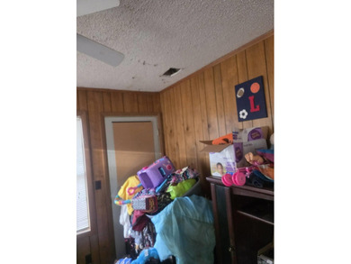 Nestled in the quiet, wooded Cartagena neighborhood of Hot on DeSoto Golf Course in Arkansas - for sale on GolfHomes.com, golf home, golf lot